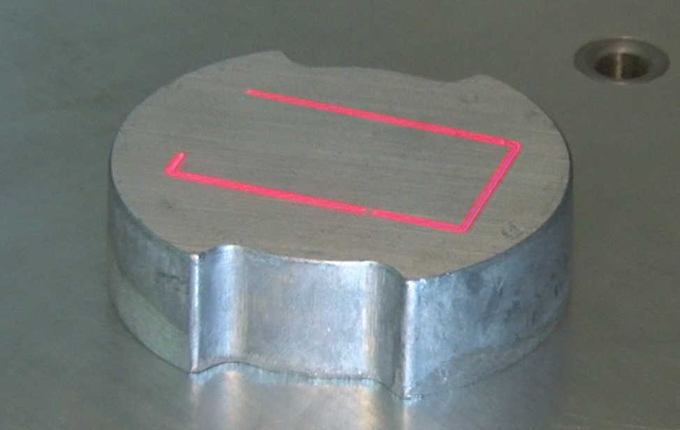 Fiber laser's Red Dot positioning laser.